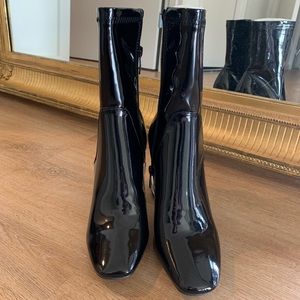 Public Desire black latex sock boots.